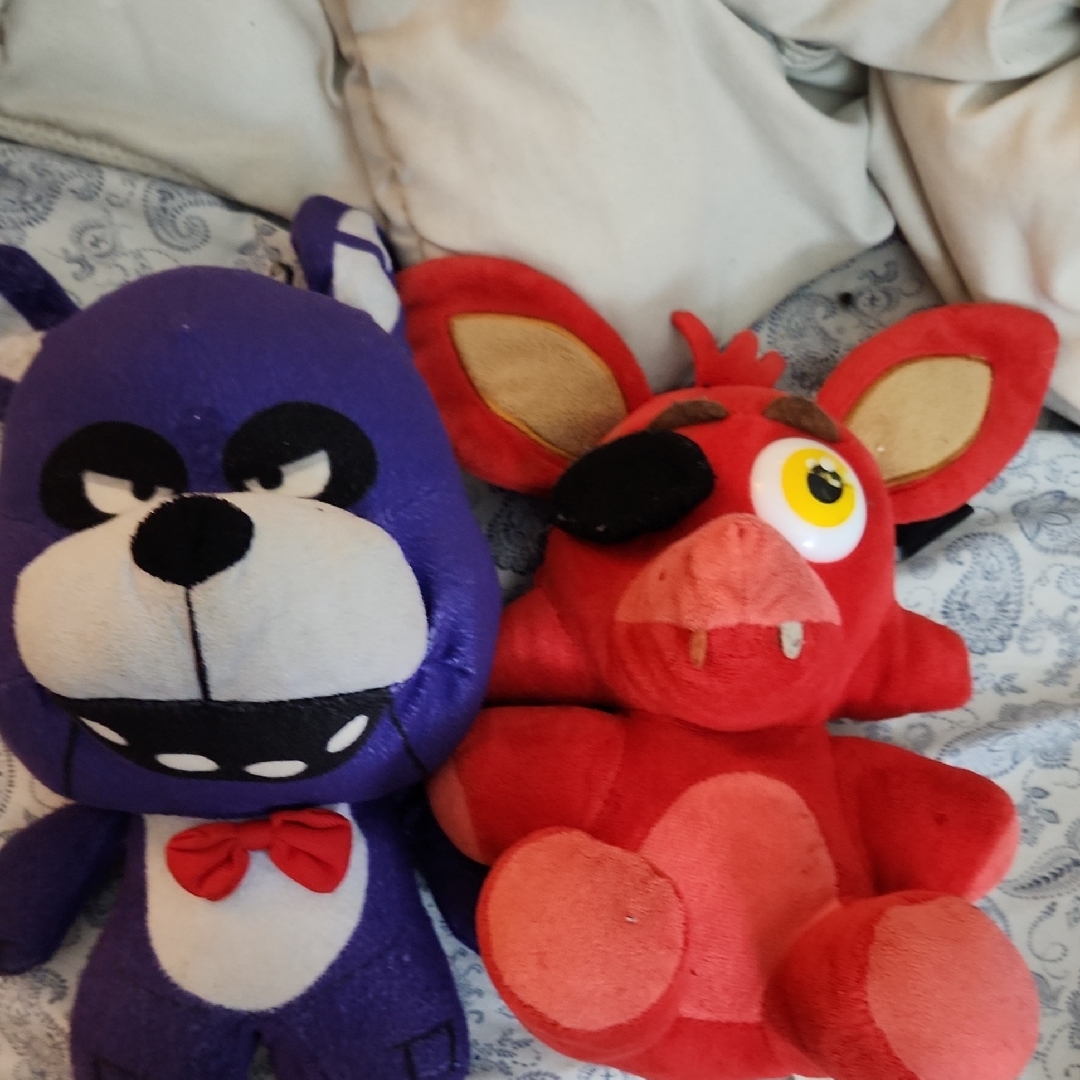 Purple And Red Plush Toys